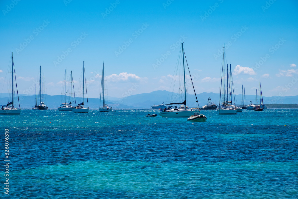 Golfo Aranci, Sardinia, Italy - Panoramic view of Golfo Aranci harbor by the yacht port - Marina di Golfo Aranci - at the Tyrrhenian Sea coast Golfo Aranci, Sardinia, Italy - Panoramic view of Golfo Aranci harbor by the yacht port - Marina di Golfo Aranci - at the Tyrrhenian Sea coast