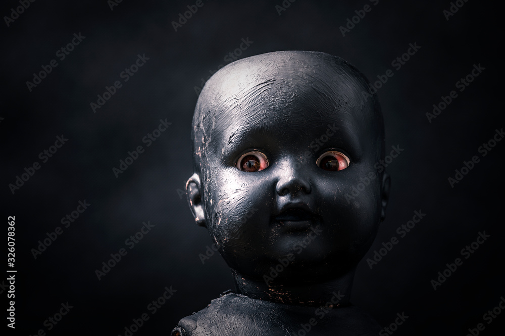 Creepy doll in the dark