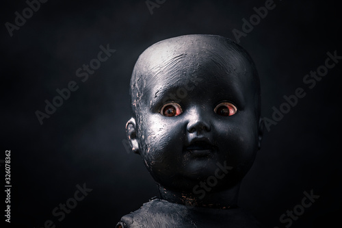 Creepy doll in the dark