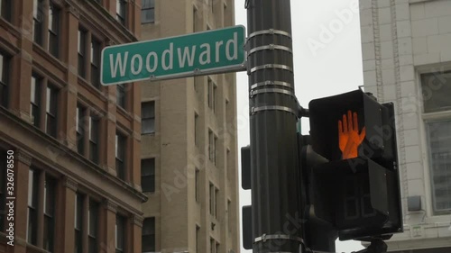 Detroit Street Sign Woodward in Downtown Detroit Cross Walk near Skyscrapers
