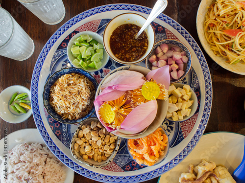 Miang kham with lotus or water lily. Miang kham is traditional snack appetizer from Thailand