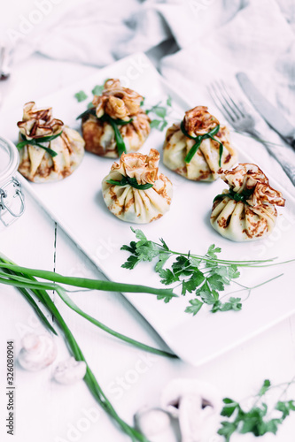 Pancakes with mushroom filling with sour cream