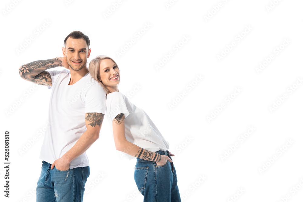 happy young tattooed couple isolated on white happy young tattooed couple isolated on white