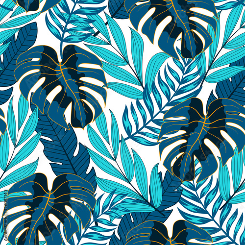 Summer seamless tropical pattern with bright leaves and plants on a white background. Beautiful seamless vector floral pattern. Exotic wallpaper.