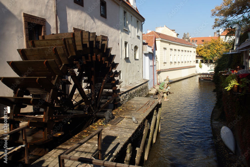 Prague (Czech Republic). Water mill and goblin on the Kafka Island of the city of Prague