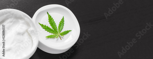 Canvas Print Cannabis CBD balm natural product, cosmetic cream from natural hemp, moisturizing lotion with CBD content