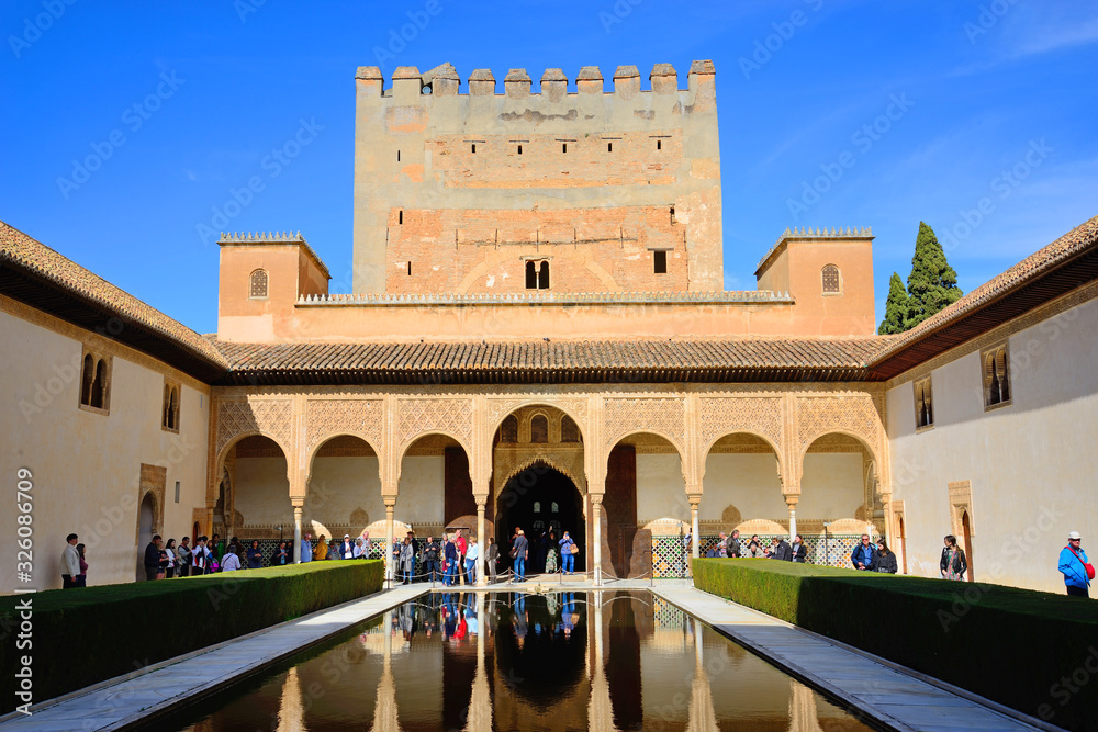Fototapeta premium Granada, Spain - February 20, 2020: Palace of the Nasrids and courtyard of the Arrayanes of the Alhambra in Granada, Spain.