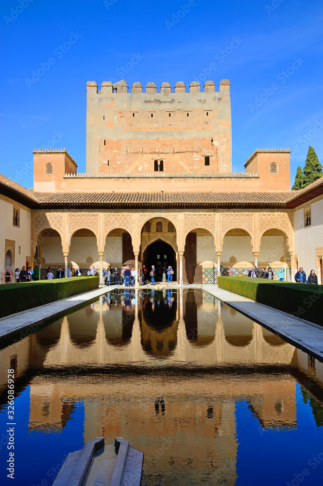 Fototapeta premium Granada, Spain - February 20, 2020: Palace of the Nasrids and courtyard of the Arrayanes of the Alhambra in Granada, Spain.
