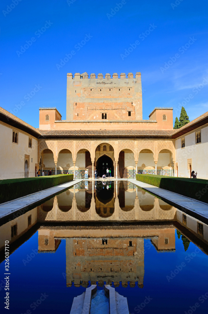 Fototapeta premium Granada, Spain - February 20, 2020: Palace of the Nasrids and courtyard of the Arrayanes of the Alhambra in Granada, Spain.