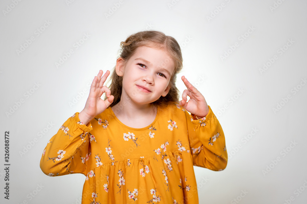 Ok Sign shows little blonde girl fingers 2 hands. Ok Sign shows little blonde girl fingers 2 hands.