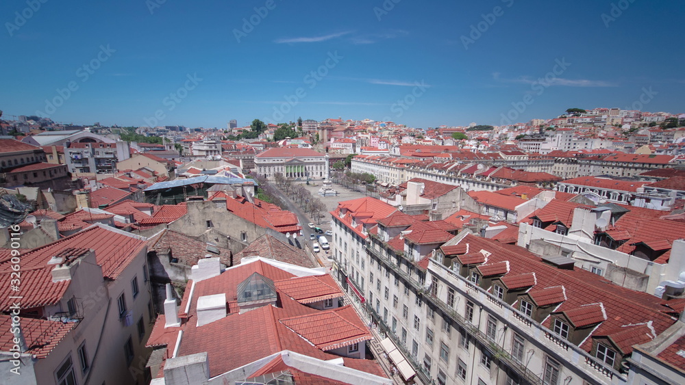 Rossio square in the central Lisbon with a monument of the king Pedro IV from Santa Justa Elevator. Portugal. timelapse