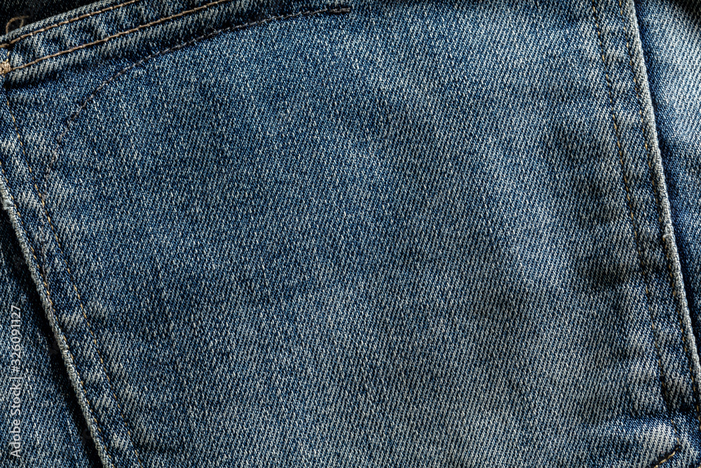 Close up shot of surface of jeans cloth texture for background or devices wallpapers. Abstract design, usual, natural materials. Detailed grungy artwork. Copyspace, advertisement. Vintage style. Close up shot of surface of jeans cloth texture for background or devices wallpapers. Abstract design, usual, natural materials. Detailed grungy artwork. Copyspace, advertisement. Vintage style.