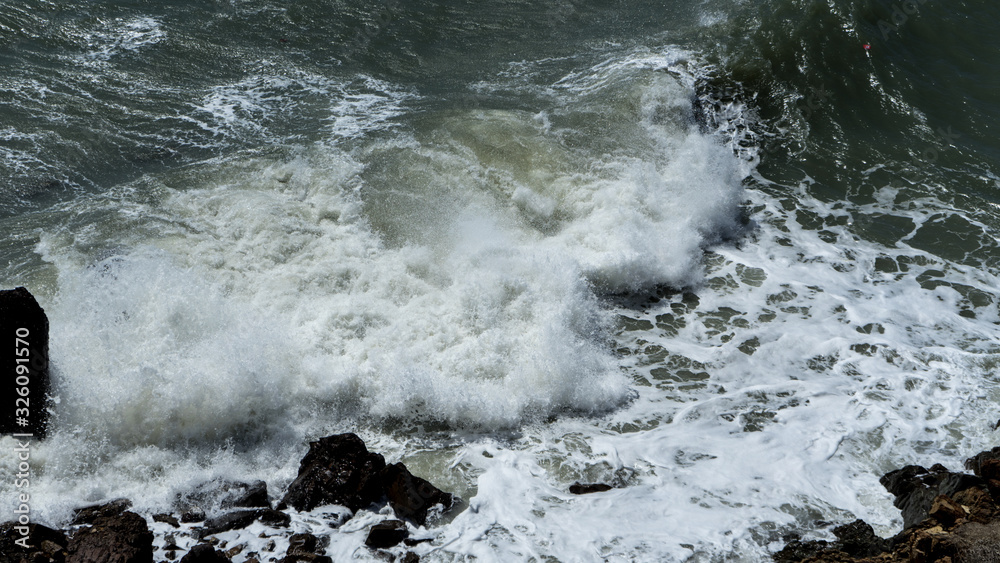 Ocean waves crashes on the rocks, windy weather on ocean. Ocean waves crashes on the rocks, windy weather on ocean.