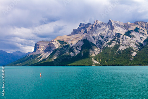 Stand Up Paddle in Lake Minnewanka - Banff National Park, Banff, Alberta, Canada photo