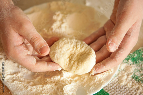 Making dough by hands at bakery