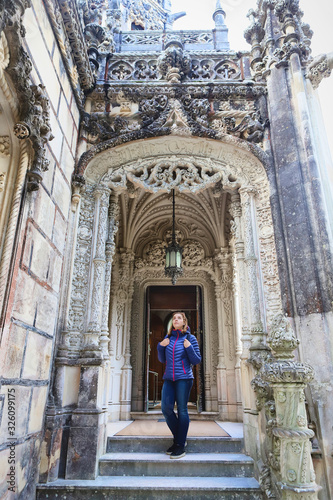 Women tourist in the Regaleira Palace (known as Quinta da Regaleira) main house located in Sintra, Portugal