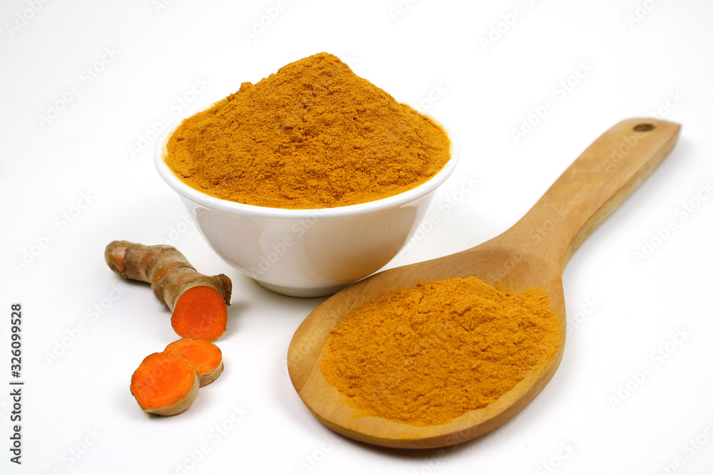Turmeric powder (curcuma) and turmeric roots isolated on a white background Is an ingredient in turmeric foods Turmeric nourishes the skin to be strong.strong.curcumin Turmeric powder (curcuma) and turmeric roots isolated on a white background Is an ingredient in turmeric foods Turmeric nourishes the skin to be strong.strong.curcumin