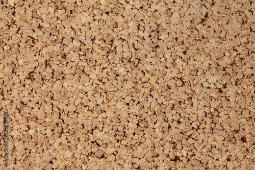 Close up shot of surface of cork floor, wall texture for background or devices wallpapers. Abstract design, usual, natural materials. Detailed grungy artwork. Copyspace, advertisement. Vintage style.