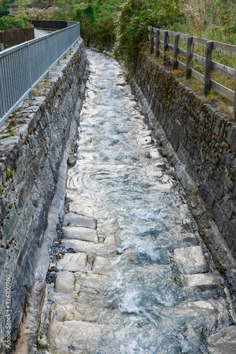 Hiking path and stream in Imst, Austria