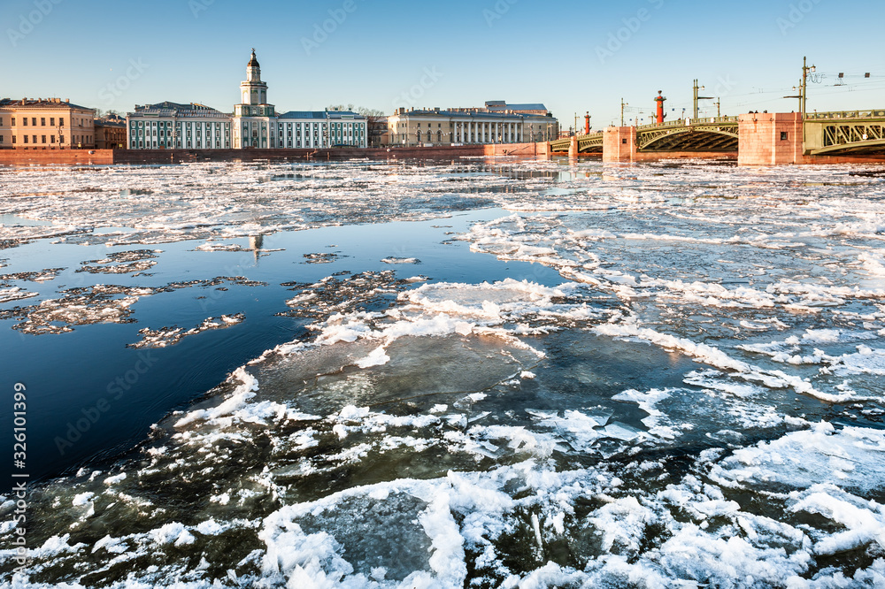 Neva river with ice in Saint Petersburg, Russia. View of the Palace Bridge