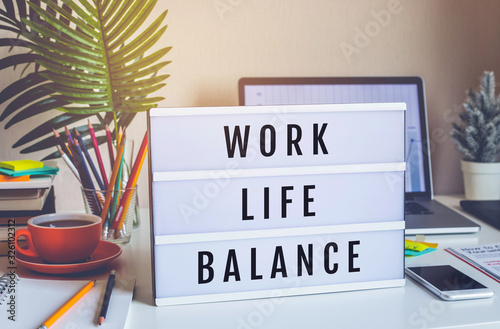 Plakat Work Life Balance concepts with text on light box on desk table in home office.positive emotion to success