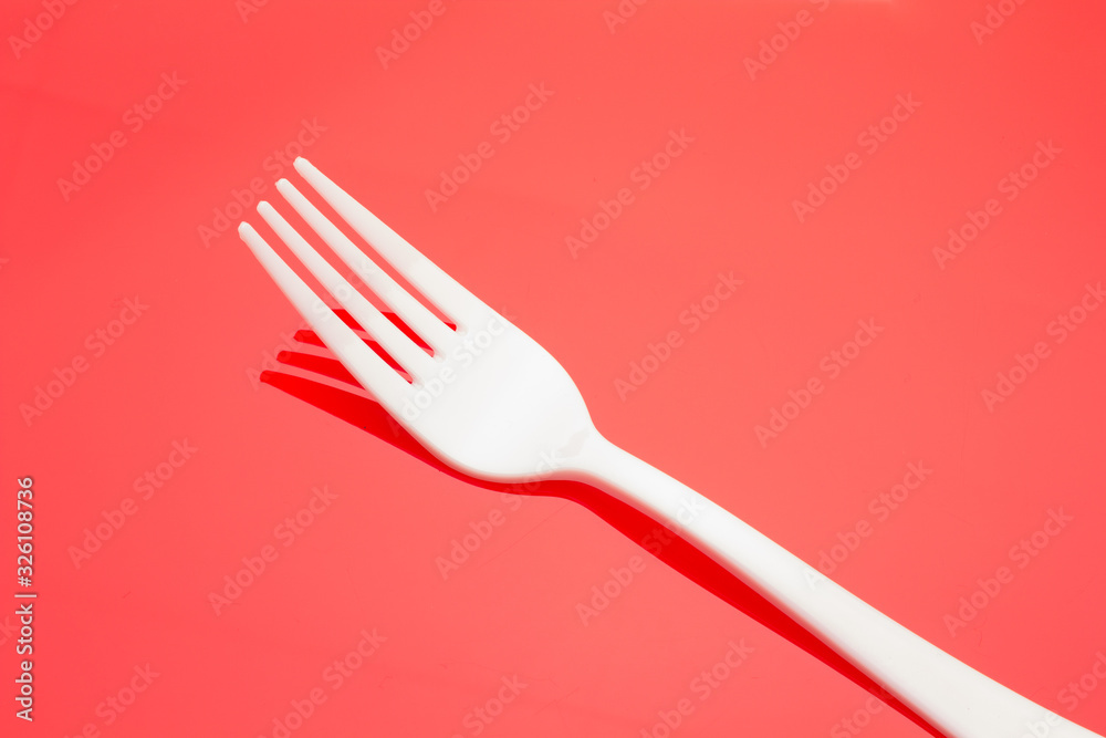 Plastic fork for casual food. White fork. Plastic fork for casual food. White fork.