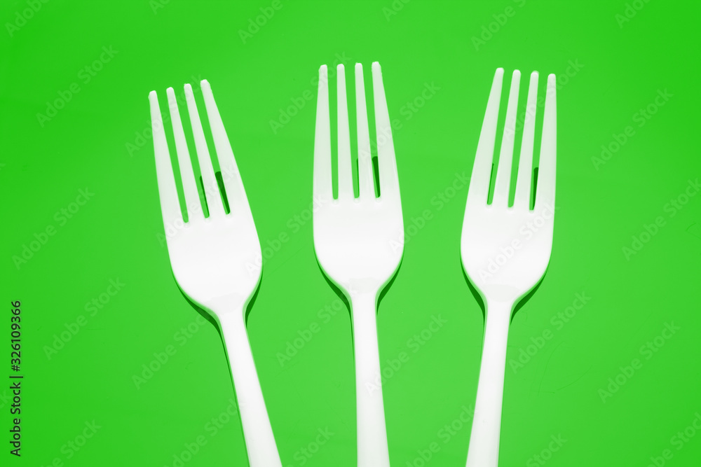 Plastic fork for casual food. White fork. Plastic fork for casual food. White fork.