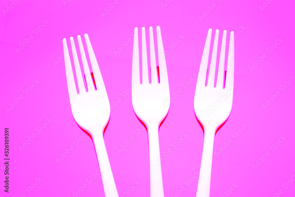 Plastic fork for casual food. White fork. Plastic fork for casual food. White fork.