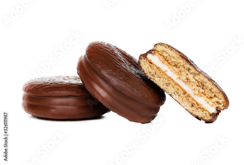 Choco pie on a white background. Chocolate covered mini cakes close-up.
