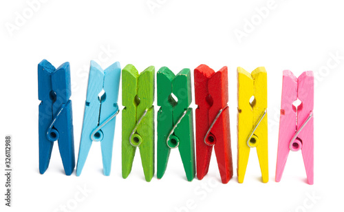 colored wooden clothespins isolated