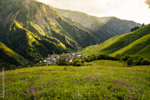 Sunset over the picturesque remote village of Adishi in Caucasus mountains. Upper Svaneti, Georgia. photo