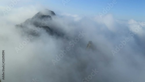 Mist, clouds rising in Huangshan national park, (Yellow Mountain) Anhui Porvince, China. photo