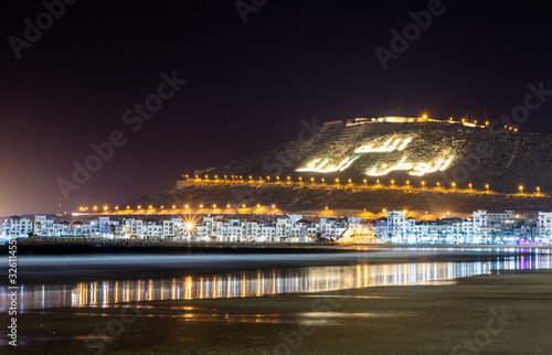 beautiful Agadir city at evening reflection and marina oufla 