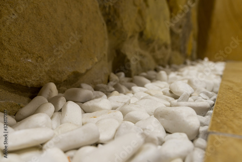 White, decorative stones in the spa salon, meditation and peace