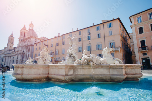 Fountain Four rivers in Piazza Navona, Rome, Italy, Europe, blue sky light sun