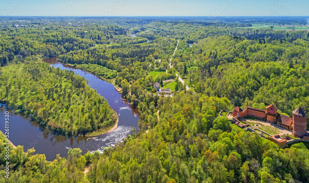Obraz premium Beautiful aerial view of medieval Turaida castle at Gauja river valley, Sigulda, Latvia