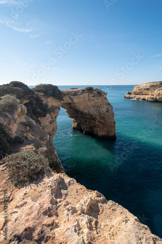 high cliffs on the shore of the Atlantic Ocean. Portugal. Algarve.