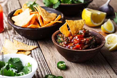 Homemade salsa and tortilla chips, favorite Mexican appetizer snack
