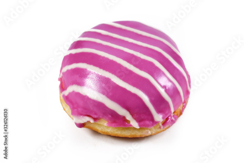  'Berliner Pfannkuchen', a traditional German dessert similar to doughnut with no hole, made from sweet yeast dough fried with pink strawberry glazing