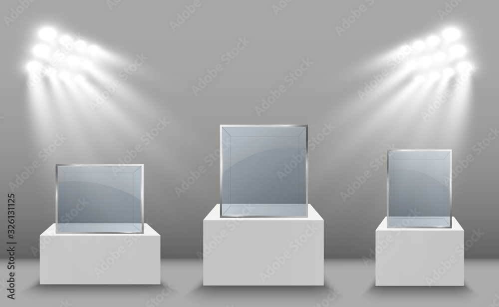 Glass showcase for the exhibition in the form of a cube. Background for sale illuminated by spotlights. Museum glass box isolated advertising or business design boutique. Exhibition hall. Glass showcase for the exhibition in the form of a cube. Background for sale illuminated by spotlights. Museum glass box isolated advertising or business design boutique. Exhibition hall.