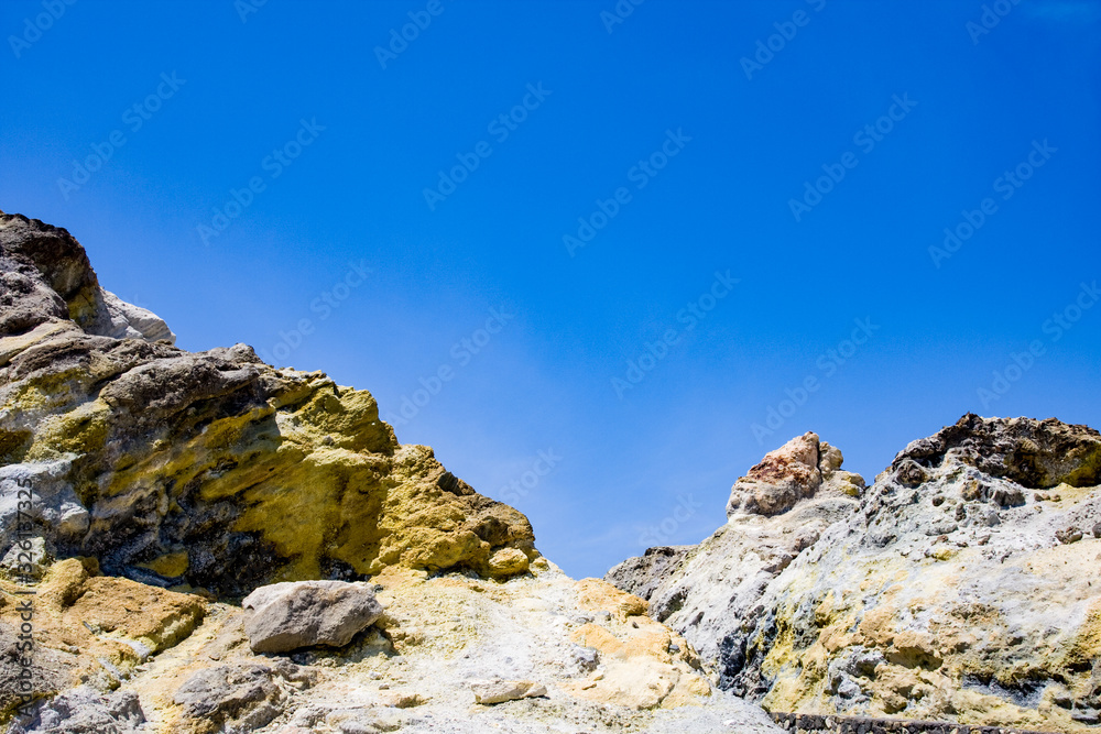 rocks with yellow sulfur-based outcrops on the island of Vulcano, Aeolian Islands, Messina, Sicily, Italy