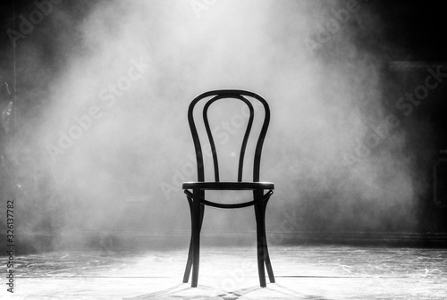 stage fog with wooden viennese chair on it