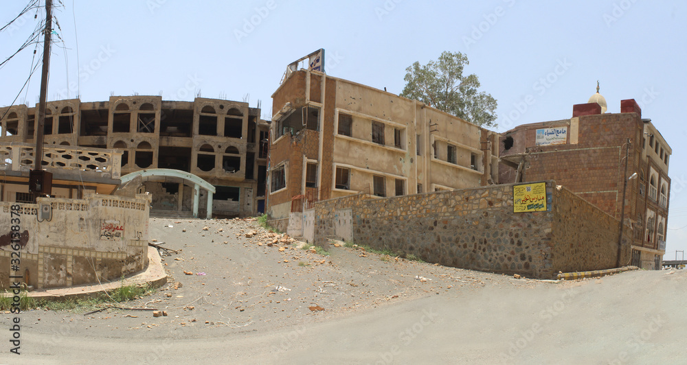 The effects of destruction on people's homes due to clashes with various weapons between the Popular Resistance and Al-Houthi militias in Taiz City .
