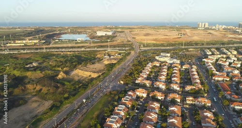 Aerial view above Netivot. A city in the Southern District of Israel located between Beersheba and Gaza strip. resindetal houses and high way road  photo