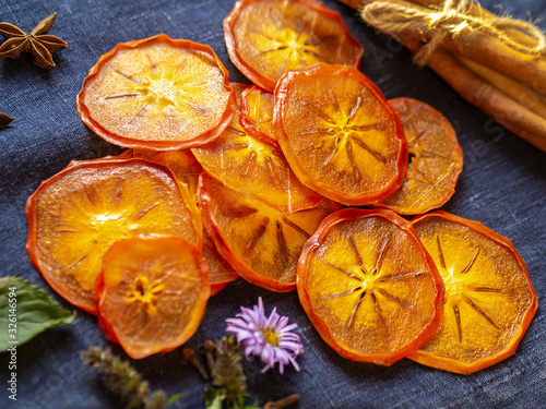 A lot of dried orange persimmon flatlay