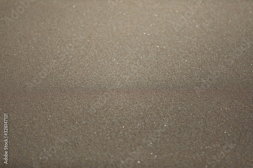 texture of sand on the beach. background, view from above