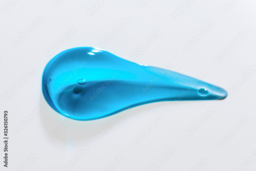 Cosmetic cream transparent liquid gel serum texture with micro bubble on white background beauty concept. Hairy serum water drop Blue hair styling gel water drop on white surface Cosmetic cream transparent liquid gel serum texture with micro bubble on white background beauty concept. Hairy serum water drop Blue hair styling gel water drop on white surface
