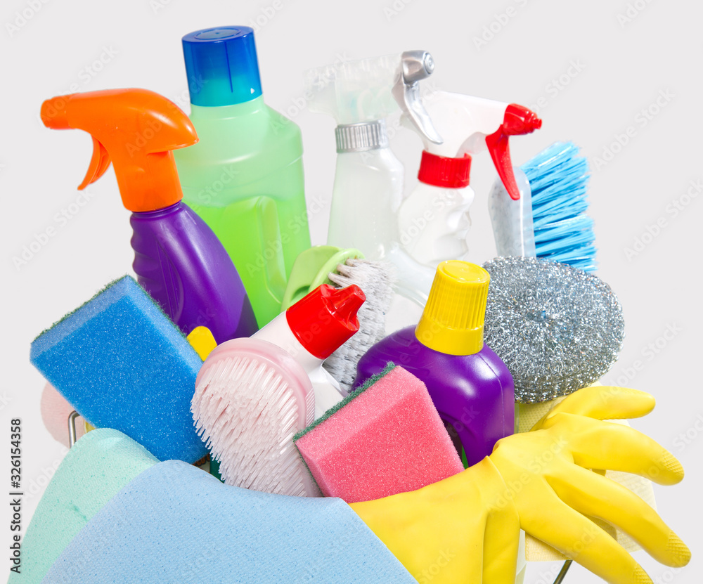 full box of cleaning supplies and gloves isolated on white full box of cleaning supplies and gloves isolated on white