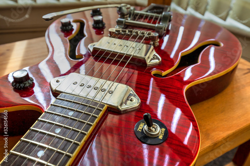 Close-up of semi hollow, electric guitar.