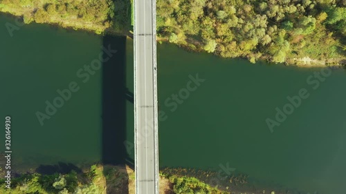 Chachersk, Belarus. Aerial View Of Bridge over the Sozh river In Summer Day. Top View Of Beautiful European Nature From High Attitude In Summer Season. Drone View. Bird's Eye View photo